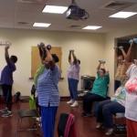 First Missionary Baptist Church congregants exercising 