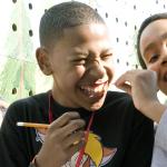 School children laughing together