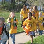 Children walking on a field trip