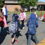 Children crossing the street to school