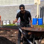 Community members and team members working in a community garden in Camden, NJ