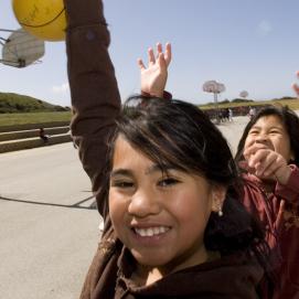 Children playing tetherball 